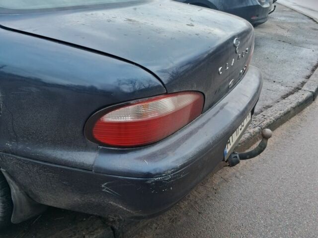 Синий Киа Кларус, объемом двигателя 2 л и пробегом 243 тыс. км за 1383 $, фото 1 на Automoto.ua