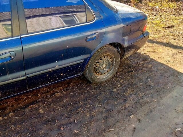 Синій Кіа Кларус, об'ємом двигуна 2 л та пробігом 200 тис. км за 850 $, фото 3 на Automoto.ua