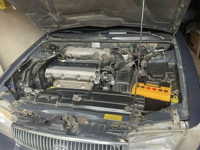 Синій Кіа Кларус, об'ємом двигуна 2 л та пробігом 301 тис. км за 1650 $, фото 4 на Automoto.ua