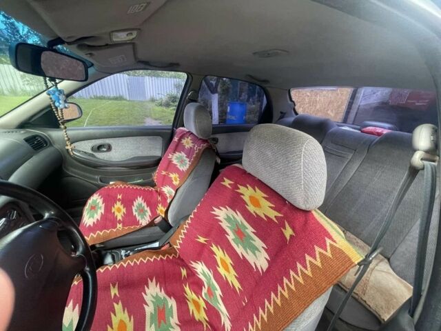 Синій Кіа Кларус, об'ємом двигуна 2 л та пробігом 301 тис. км за 1650 $, фото 5 на Automoto.ua