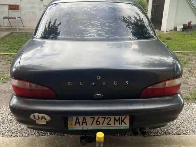 Синій Кіа Кларус, об'ємом двигуна 2 л та пробігом 301 тис. км за 1650 $, фото 1 на Automoto.ua