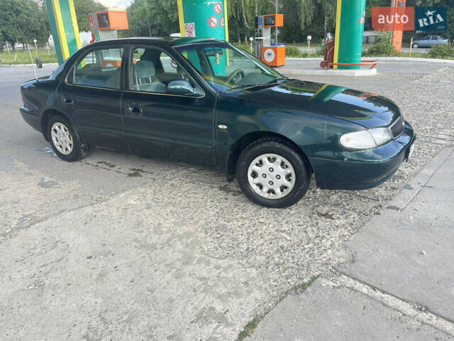 Зелений Кіа Кларус, об'ємом двигуна 1.79 л та пробігом 240 тис. км за 1450 $, фото 1 на Automoto.ua
