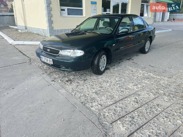 Зелений Кіа Кларус, об'ємом двигуна 1.79 л та пробігом 240 тис. км за 1450 $, фото 11 на Automoto.ua