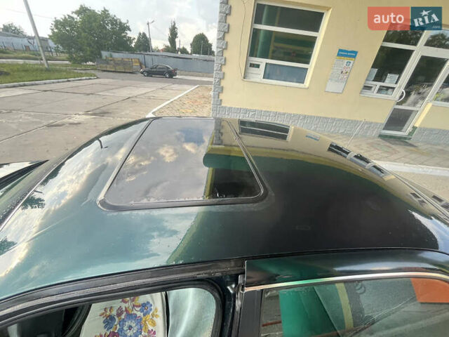 Зелений Кіа Кларус, об'ємом двигуна 1.79 л та пробігом 240 тис. км за 1450 $, фото 8 на Automoto.ua