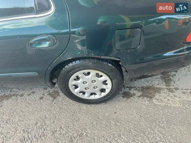 Зелений Кіа Кларус, об'ємом двигуна 1.79 л та пробігом 240 тис. км за 1450 $, фото 3 на Automoto.ua