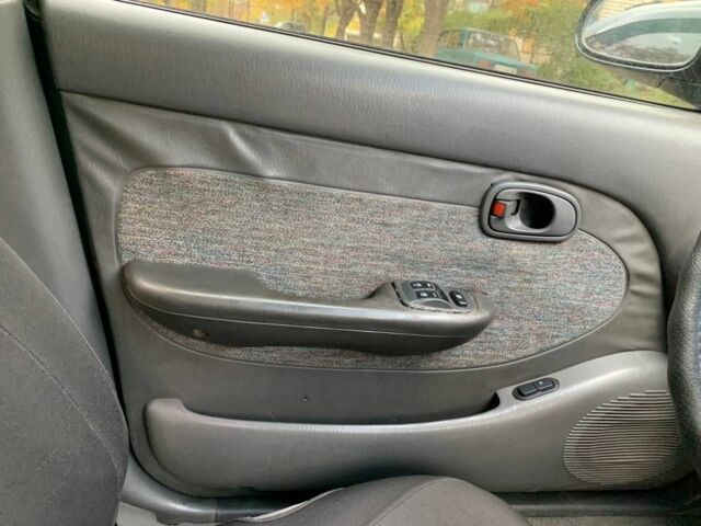 Зеленый Киа Кларус, объемом двигателя 2 л и пробегом 300 тыс. км за 1668 $, фото 4 на Automoto.ua