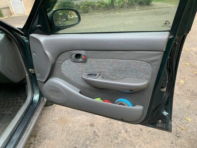 Зеленый Киа Кларус, объемом двигателя 2 л и пробегом 300 тыс. км за 1668 $, фото 6 на Automoto.ua