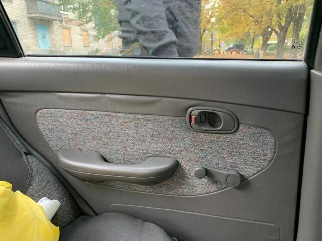 Зеленый Киа Кларус, объемом двигателя 2 л и пробегом 300 тыс. км за 1668 $, фото 5 на Automoto.ua