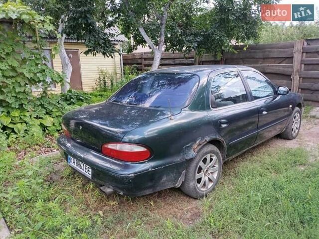 Зеленый Киа Кларус, объемом двигателя 2 л и пробегом 323 тыс. км за 1000 $, фото 3 на Automoto.ua