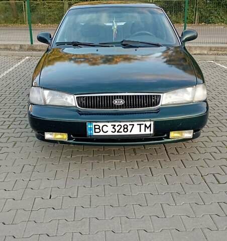 Зелений Кіа Кларус, об'ємом двигуна 1.79 л та пробігом 260 тис. км за 1450 $, фото 5 на Automoto.ua