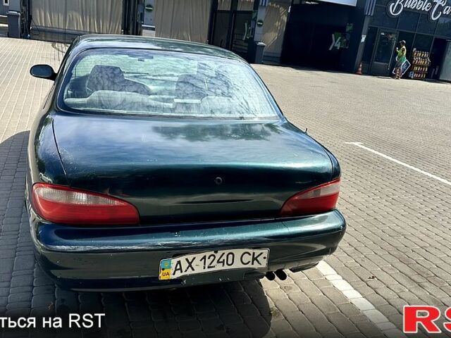 Зеленый Киа Кларус, объемом двигателя 2 л и пробегом 356 тыс. км за 1599 $, фото 4 на Automoto.ua