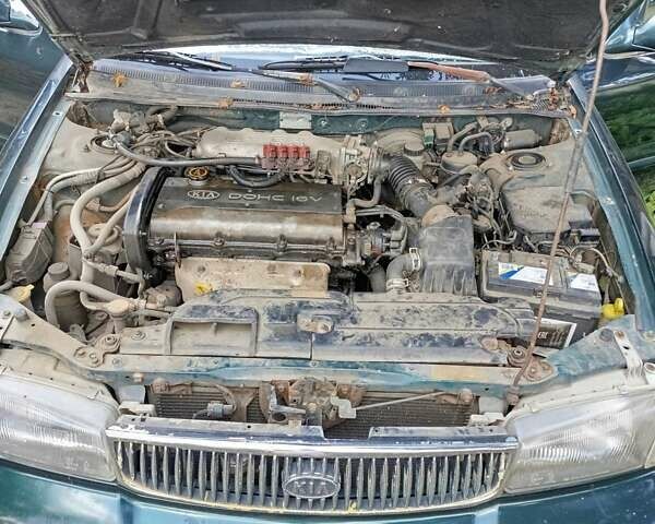 Зеленый Киа Кларус, объемом двигателя 2 л и пробегом 323 тыс. км за 1000 $, фото 10 на Automoto.ua