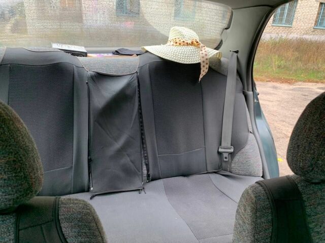 Зеленый Киа Кларус, объемом двигателя 2 л и пробегом 300 тыс. км за 1668 $, фото 2 на Automoto.ua