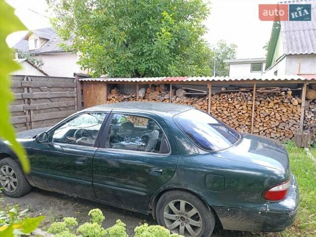 Зеленый Киа Кларус, объемом двигателя 2 л и пробегом 323 тыс. км за 1000 $, фото 1 на Automoto.ua