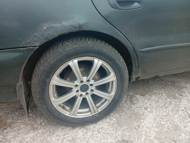 Зеленый Киа Кларус, объемом двигателя 2 л и пробегом 310 тыс. км за 1400 $, фото 14 на Automoto.ua