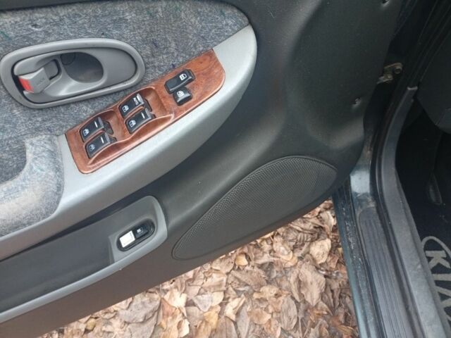 Зеленый Киа Кларус, объемом двигателя 2 л и пробегом 310 тыс. км за 1400 $, фото 6 на Automoto.ua