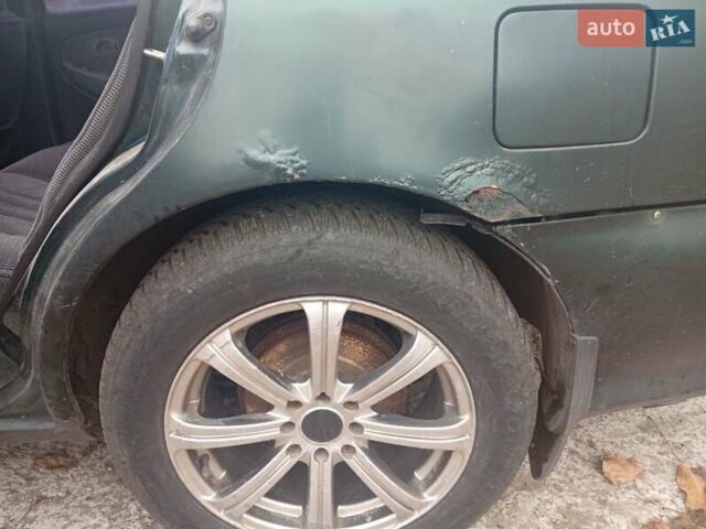 Зелений Кіа Кларус, об'ємом двигуна 2 л та пробігом 320 тис. км за 1250 $, фото 4 на Automoto.ua