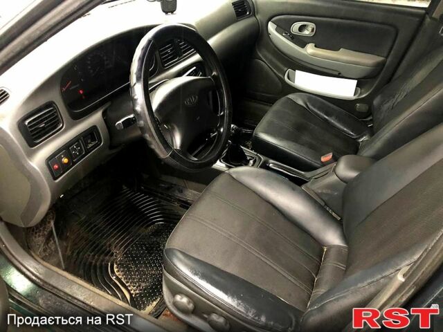 Зеленый Киа Кларус, объемом двигателя 1.8 л и пробегом 300 тыс. км за 2000 $, фото 1 на Automoto.ua