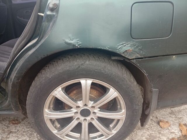 Зеленый Киа Кларус, объемом двигателя 2 л и пробегом 310 тыс. км за 1400 $, фото 15 на Automoto.ua