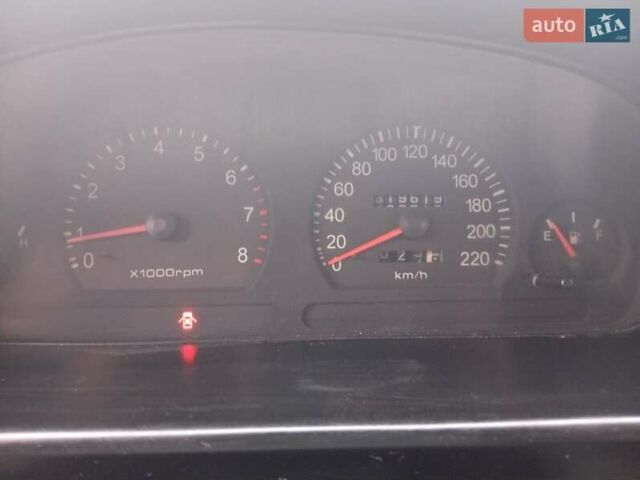 Зелений Кіа Кларус, об'ємом двигуна 2 л та пробігом 320 тис. км за 1250 $, фото 13 на Automoto.ua