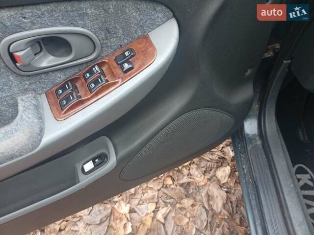 Зелений Кіа Кларус, об'ємом двигуна 2 л та пробігом 320 тис. км за 1250 $, фото 11 на Automoto.ua