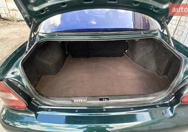 Зеленый Киа Кларус, объемом двигателя 2 л и пробегом 310 тыс. км за 2300 $, фото 9 на Automoto.ua