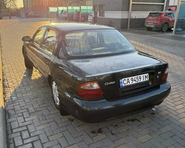 Зеленый Киа Кларус, объемом двигателя 2 л и пробегом 461 тыс. км за 1200 $, фото 3 на Automoto.ua