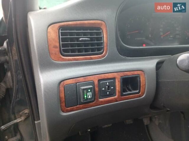 Зелений Кіа Кларус, об'ємом двигуна 2 л та пробігом 320 тис. км за 1250 $, фото 12 на Automoto.ua