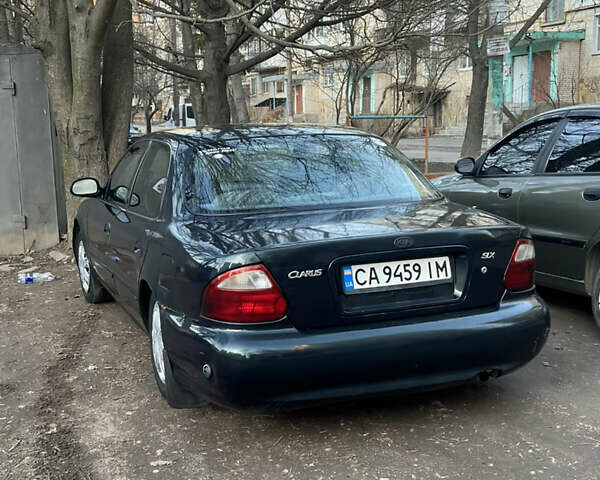 Зеленый Киа Кларус, объемом двигателя 2 л и пробегом 461 тыс. км за 1200 $, фото 6 на Automoto.ua