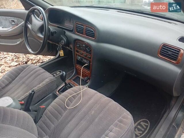 Зелений Кіа Кларус, об'ємом двигуна 2 л та пробігом 320 тис. км за 1250 $, фото 8 на Automoto.ua