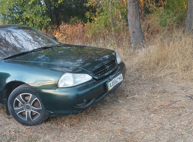 Зеленый Киа Кларус, объемом двигателя 2 л и пробегом 350 тыс. км за 900 $, фото 1 на Automoto.ua