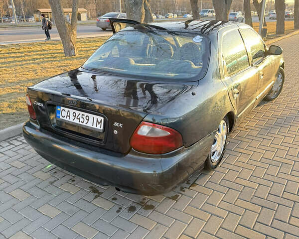 Зеленый Киа Кларус, объемом двигателя 2 л и пробегом 461 тыс. км за 1200 $, фото 4 на Automoto.ua