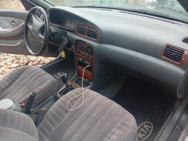 Зеленый Киа Кларус, объемом двигателя 2 л и пробегом 310 тыс. км за 1400 $, фото 3 на Automoto.ua