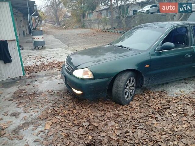 Зелений Кіа Кларус, об'ємом двигуна 2 л та пробігом 320 тис. км за 1250 $, фото 14 на Automoto.ua