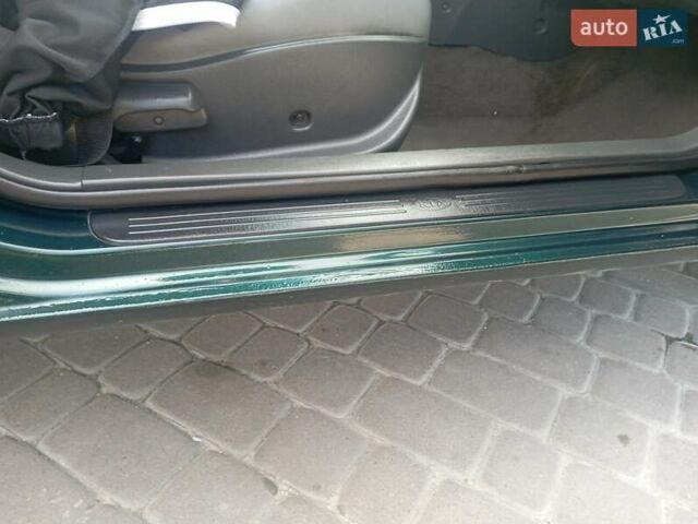 Зелений Кіа Кларус, об'ємом двигуна 1.8 л та пробігом 170 тис. км за 1850 $, фото 4 на Automoto.ua