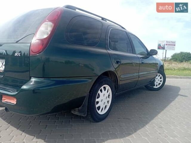 Зелений Кіа Кларус, об'ємом двигуна 1.8 л та пробігом 170 тис. км за 1850 $, фото 11 на Automoto.ua