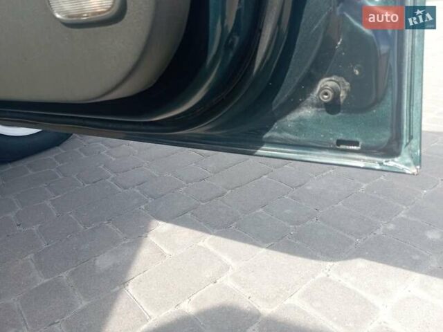 Зелений Кіа Кларус, об'ємом двигуна 1.8 л та пробігом 170 тис. км за 1850 $, фото 3 на Automoto.ua