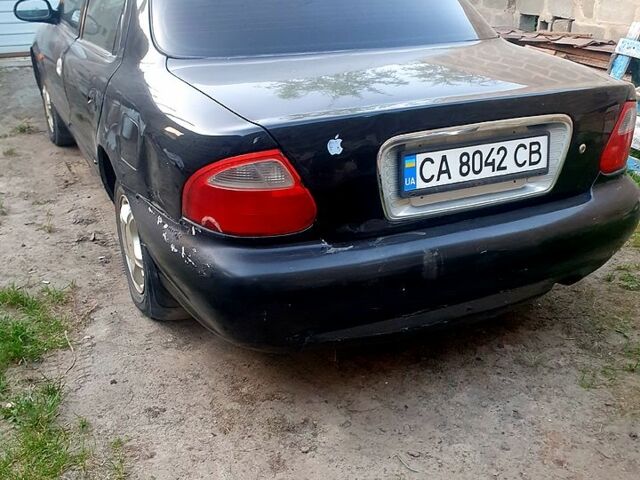 Чорний Кіа Кредос, об'ємом двигуна 2 л та пробігом 315 тис. км за 900 $, фото 6 на Automoto.ua