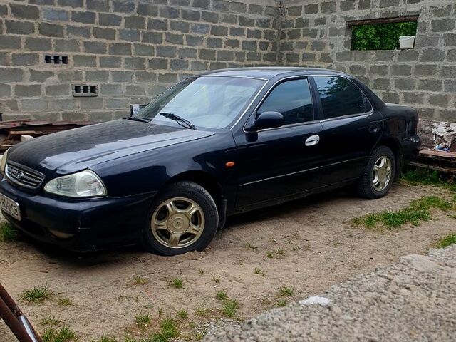 Чорний Кіа Кредос, об'ємом двигуна 2 л та пробігом 315 тис. км за 900 $, фото 4 на Automoto.ua