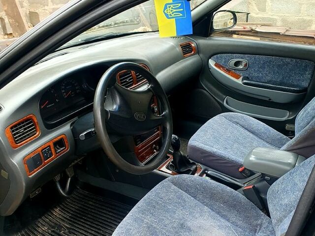 Чорний Кіа Кредос, об'ємом двигуна 2 л та пробігом 315 тис. км за 900 $, фото 3 на Automoto.ua