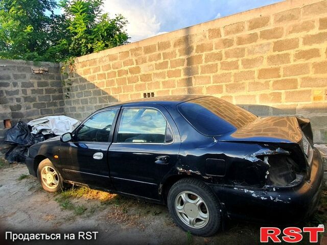 Киа Кредос, объемом двигателя 2 л и пробегом 315 тыс. км за 900 $, фото 8 на Automoto.ua