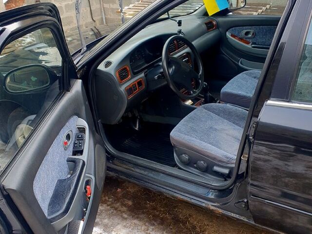 Киа Кредос, объемом двигателя 2 л и пробегом 315 тыс. км за 900 $, фото 7 на Automoto.ua