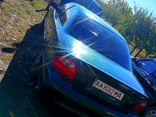Зелений Кіа Кредос, об'ємом двигуна 2 л та пробігом 100 тис. км за 1800 $, фото 4 на Automoto.ua