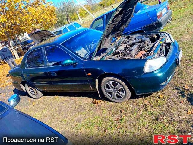 Зелений Кіа Кредос, об'ємом двигуна 2 л та пробігом 100 тис. км за 1800 $, фото 3 на Automoto.ua