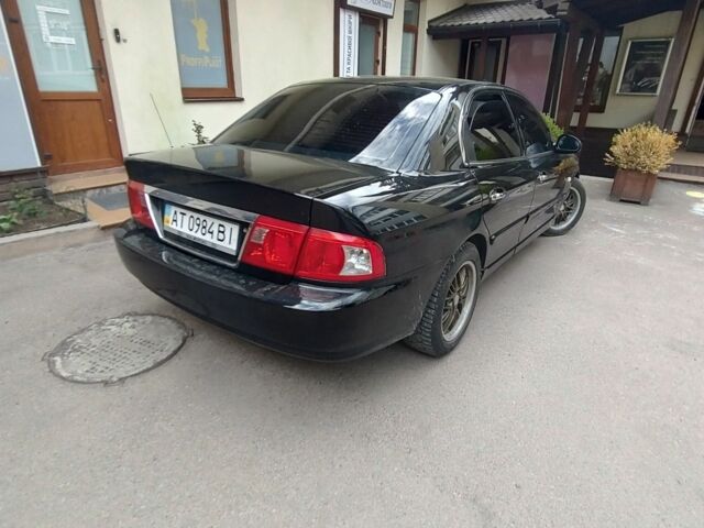 Черный Киа Другая, объемом двигателя 2 л и пробегом 240 тыс. км за 4100 $, фото 1 на Automoto.ua