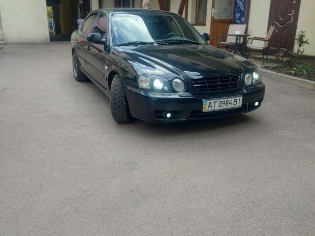 Черный Киа Другая, объемом двигателя 2 л и пробегом 240 тыс. км за 4100 $, фото 3 на Automoto.ua