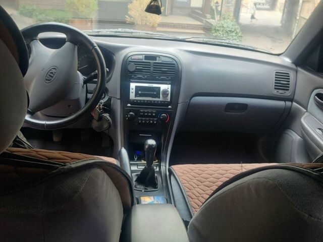 Черный Киа Другая, объемом двигателя 2 л и пробегом 240 тыс. км за 4100 $, фото 6 на Automoto.ua