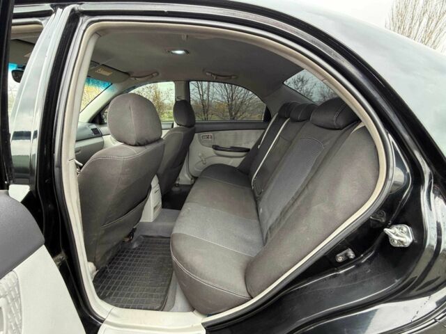 Чорний Кіа Інша, об'ємом двигуна 1.6 л та пробігом 224 тис. км за 4900 $, фото 13 на Automoto.ua