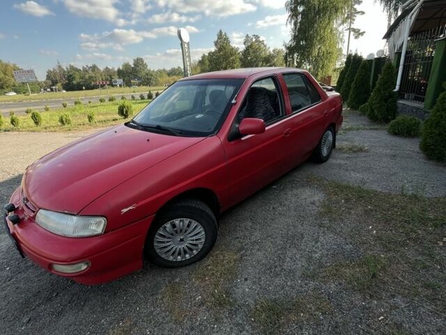 Красный Киа Другая, объемом двигателя 1.5 л и пробегом 245 тыс. км за 1100 $, фото 1 на Automoto.ua