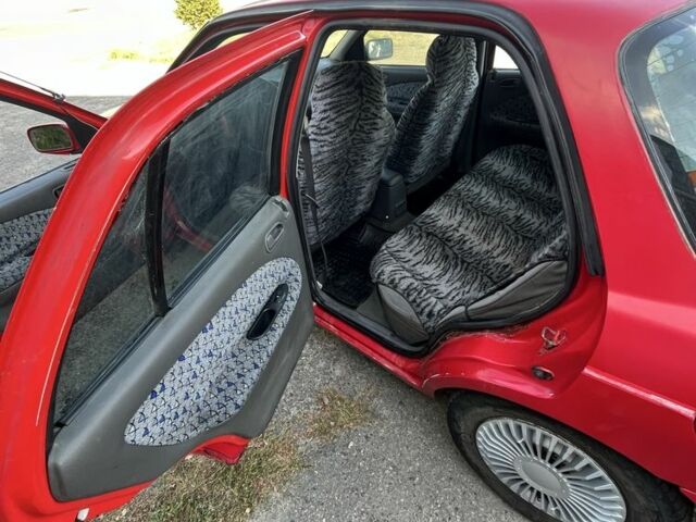 Красный Киа Другая, объемом двигателя 1.5 л и пробегом 245 тыс. км за 1100 $, фото 6 на Automoto.ua